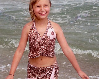 Cassie Saylor, 10, of Canfield enjoys a visit to the Jersey Shore while vacationing with her uncle, Douglas Webb, formerly of Canfield. Photo from Nancy Webb of Boardman.