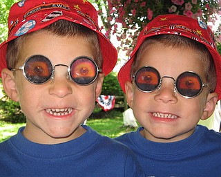 The photo of the crazy glasses, are of my twin Nephews Joshua Anthony Maggie and Jordan Robert Maggie. We were getting ready to take a vacation to Ocean City Maryland and we purchased these glasses so that they could have fun on the way down...starring out the windows at the other drivers. They are both wild and crazy kids, who loved playing around with the glasses. We are all from New Castle, Pa. -- Mackenzie Jo Maggie
