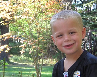 he other other photo was taken in our backyard under a beautiful Japanese maple tree that has the most beautiful colors during the end of summer and early fall. The little boy in that photo is my nephew, Ryan Joseph Maggie Jr. We are all from New Castle, Pa. -- Mackenzie Jo Maggie