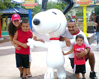 My name is Renee Bero and in August, I took the picture of my daughters' family at Cedar Point. They were really enjoying themselves in the Planet Snoopy kids area.
They are Elizabeth Jorge with Santino Jorge; and Michael Jorge with Alex Jorge.
