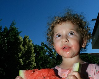 We took our 3 young children to Cyprus this summer to meet their cousins for the first time. As you can see, what they loved most was the Karpuzi (Watermelon)!
Loukia with Karpuzi
Jef Davis
Poland