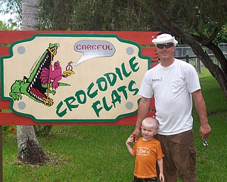Seth Matey of New Springfield with son Ryan outside of the Alligator Farm in the Everglades