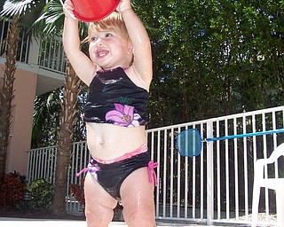 Cali Matey cooling off near the pool while vacationing in Key Largo, Fla. Sent by Kelly Matey, New Springfield.