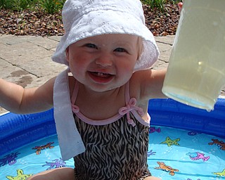 Payton enjoying some time in her baby pool...the ultimate staycation!
Chad and Alyson Zwingler
Canfield