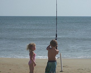 Liam, 4, and Madigan, 3, catching a whopper in Kitty Hawk, NC. Outer banks. Photo from mom Lori Miller of Salem.
