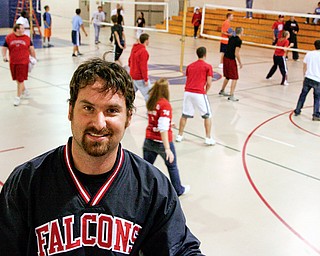 Pastor Lou Scalzo helps teenagers have fun at Highway Tabernacle's Fifth Quarter instead of getting into trouble.