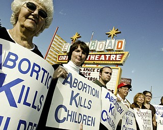 L-R Phyllis Manges of Girard, Vickie Shick of Brookfield, Brandon Cagley of Girard, Pastor Nick Furrie of Girard, Carolyn Furrie of Girard, Savanna Frantz of Girard, James Frantz of Girard and Cheryl Metz of McDonald protest abortion on Elm Road in Warren, Sunday October 5, 2008. Daniel C. Britt.