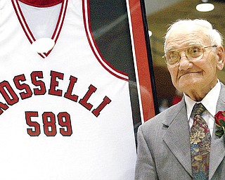 Don Rosselli is honored with a jersey in his name during a ceremony at halftime at Beeghly Stadium marking his years as a YSU basketball coach. The number589 on the jersey denotes the number of wins YSU had under the instruction of Rosselli