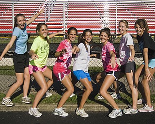 Canfield Cardinals Cross-Country Girls: L-R, Jillian Smith, 16, Elizabeth Wilkens, 16, Katie Tiberio, 15, Nicole Tiberio, 15, Shannon Reed, 18, and Cathyrn Zetts, 15, and Marla Marucci, 15, all of Canfield. Daniel C. Britt.