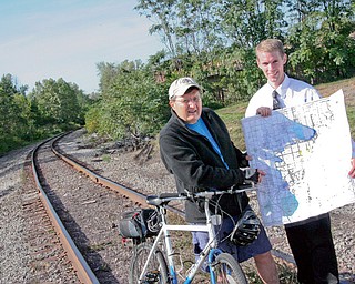 From left to right: Metro Parks Board Member, Dave Ambrose, and Trumbull County Planner Jonathan Millea say they have 4 phases left in Trumbull County and are hopeful that the bike trails will be done in three to five years in this area.
