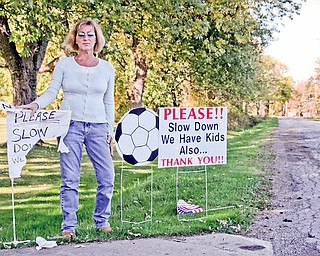 Carolyn Marinelli lives on Miller Road in Poland Township. The recent opening of Poland Township Park has brought in 1,000+ cars for the soccer games. Her petition is about the speeding and congestion. Every day life has been shaken up by the speeders and some people have gone as far as to shred her hand made sign.