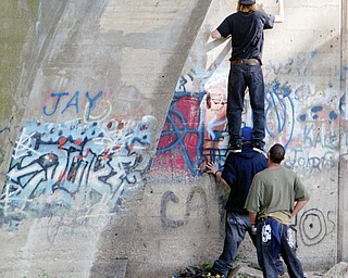 FINAL WORDS TO A FRIEND: Unidentified youths spray paint "R.I.P JAY" on the Girard/McDonald underpass near where 12-year-old Jamel Smith of Girard drowned Monday. The young people painted the structure Wednesday. Jamel was a seventh-grader at Girard Middle School