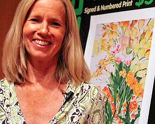 GARDEN GURU: HGTV’s Erica Glasener, standing, spoke to garden enthusiasts Saturday in a presentation of “On the Road with a Gardener’s Diary” at Mill Creek MetroParks’ Fellows Riverside Gardens. Glasener, host of HGTV’s “A Gardener’s Diary,” is also an author.