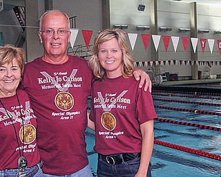 L-R Lois and Paul Carlson with their daughter, Kristen Matthus sponsor the 5th annual Special Olympics swim meet in memory of Kelly Jo Carlson (Kristen's sister) Sunday October 26, 2008.