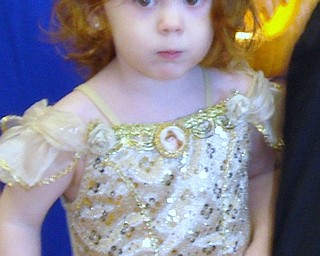 "I would smile, but my mouth is full of candy!"  This is Alyse Murphy, age 2, dressed as a Golden Princess on Oct. 19t at the Parents of Allergic Kids Halloween Party. She is the daugher of Theresa and Kevin Murphy of Cortland.
                              