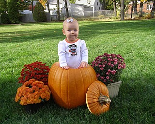 Audrey Solvesky, 8 months, takes her place as a Halloween decoration. She's the daughter of Katie Solvesky of Boardman.