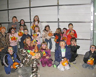 Attached is a photo taken at Countryside Farms in Poland, Ohio when the National Slovak Society's Assembly 731 held their annual Halloween Hayride for members and friends.  Following their hayride, the kids picked a pumpkin from the pumpkin patch and then decorated them with funny faces.
Josie, Marlie and Tod Applegarth (New Springfield)
Shae and Mikayla Hanley (New Springfield)
JJ and Jake Williams (Petersburg)
Layla and Olivia Taylor (Poland)
Bella Cathline (Poland)
Michael, Bridget and Natalie DiVencenzo (Struthers)
Logan Johnson (Struthers)
Tiffany Harter (North Lima)
Christian Burns (North Lima)
Savannah and Tyler Wymer (North Lima)
Andrew and Nicholas Cessna (Boardman)          