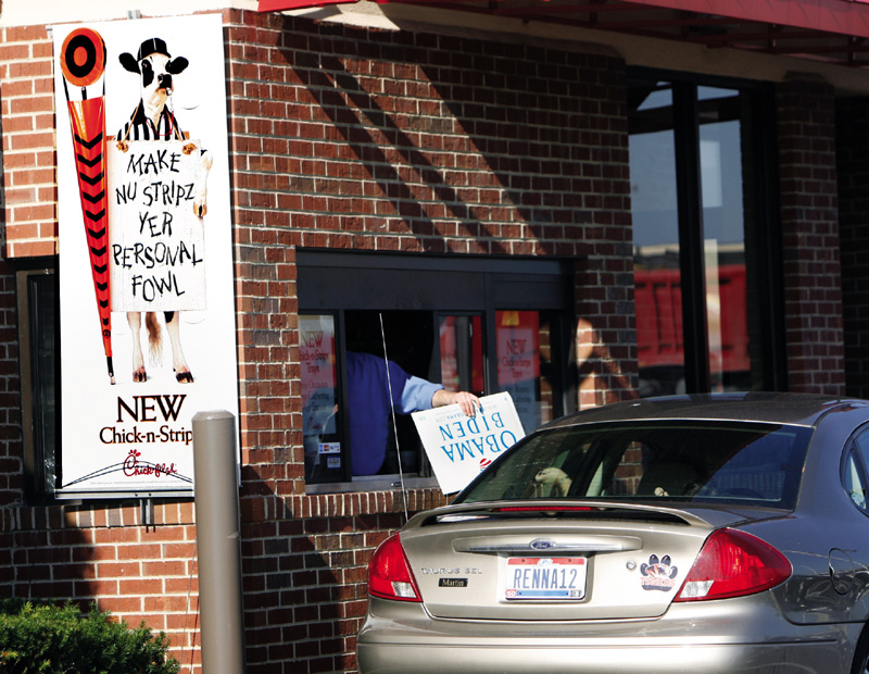 Recycling signs for food at Chick Fil A