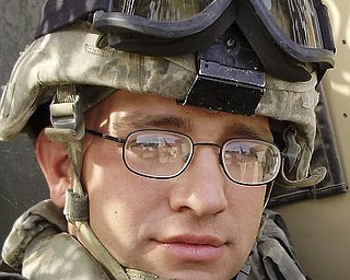 SPC E4 Joshua J. Bentley
HH C1-21 IN BN
Camp Liberty, Iraq
APO AE 09344
Serving as a gunner on a mine roller in Iraq.
Attended Austintown Fitch High School.
Resident of Columbiana. Son of Karen and Laura Bentley-Davis, also of Columbiana.