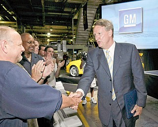 General Motors Chairman and CEO Rick Wagoner (right) greets attendees at a press conference announcing GM’s $350 million investment to build the all-new Chevrolet Cruze global compact car at the plant in Lordstown, Ohio Thursday, August 21, 2008. An additional $150 million will be allocated the Chevy Cruze product program in the U.S.  The Chevy Cruze will be officially unveiled at the upcoming Paris Motor Show. 