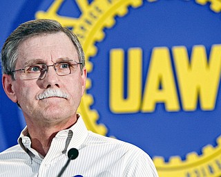 In this Oct. 7, 2008 file photo, United Auto Workers president Ron Gettelfinger talks to reporters in Detroit. Even as Detroit's Big Three automakers teeter on collapse, Gettelfinger says workers will not make any more concessions and that the getting the automakers back on their feet means figuring out a way to turn around the economy.