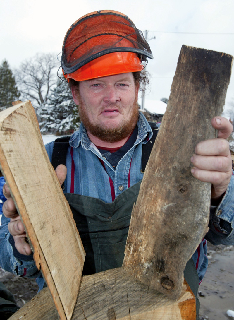 Bill Spithaler of Gustavus Hardwoods shows some firewood. 