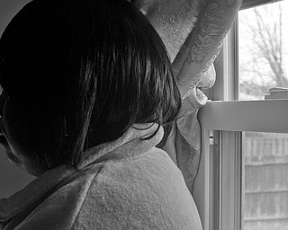 Denise, a 44-year-old black woman poses near a window in her Warren home. Denise contracted HIV from her husband, who died of the disease. HIV/AIDS stigma affected her from the inside, out, she said. For ten years she did not seek treatment and battled immobilizing anxiety and long bouts of depression. Her dogmatic view of HIV as a "death sentence" supported her misguided belief that her doctors had given her the wrong diagnosis. It wasn't until after a near-death sickness and multiple hospitalizations and recoveries did she gain the confidence needed to work again.
"Ten years of my life was caught up in the 'what-if.' Oh, If I could have that back, there's so much I would have done," Denise said.
She is currently contemplating a career in public relations for HIV/AIDS non-profits.