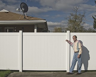 Bill Bogan, a gay, Caucasian male, and outspoken advocate of AIDS/HIV awareness, stands near the high white fence that separates his yard from his neighbors in Struthers. Since he was diagnosed with HIV in the mid-nineties, Bill said he has come face to face with the stigma attached to the disease continually. First, when he was fired after his employer found out what his prescriptions were for and, most recently, while working in his backyard. Bill said he heard his neighbors discuss how their property values will sink as a result of his status.
"If I move, they were saying, my house would have to be burned down," Bill said.