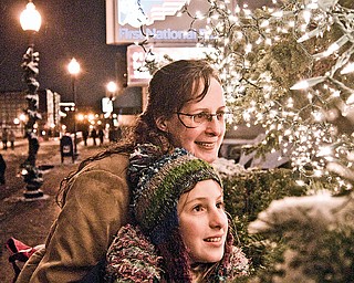 Patty LaRocca and her daughter Leah, 11, both of Sharon got a close-up view of the christmas lights on West State Street.