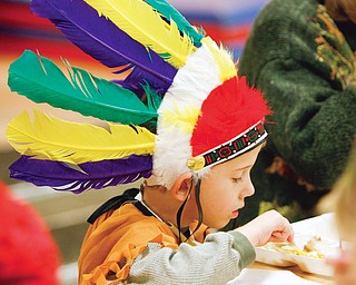 George Cottrill - kindergarten student at Jackson Elementary in Niles donned an authentic Chiefs hat as the elementary school had Turkey and the fixings and songs afterward.