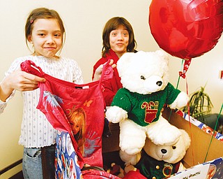 Katherine and Joshua Chin, sister and brother, announce the start of Operation: Pajama Express. It is a project intended to supply new pajamas and teddy bears to children who will be spending the holidays in foster care, shelters, rescue missions and places other than a home of their own.