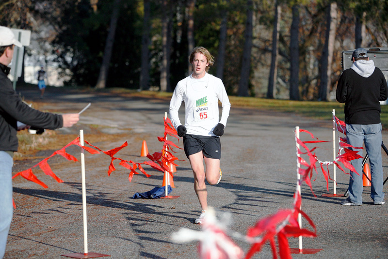 FINISH LINE: Scott Wolfe of East Palestine runs to victory at the first East Palestine Turkey Trot on Thanksgiving Day. Organizers hope to make the run an annual event.