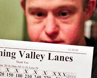 Mike Baltes (36) of Youngstown accomplishes his 2nd life goal of bowling a perfect game within months of achieving the first of swimming with dolphins.