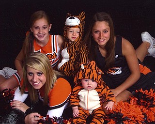 Clockwise from the left, Jordan Pesher, Raylor Remner (Sprinfield Local cheerleaders), Jacob Wiery (a mascot), Morgan McMurray (track member) and Ashley Rupert (mascot). Shelly Remner sent the photo and says the crew loves getting together for sporting events.