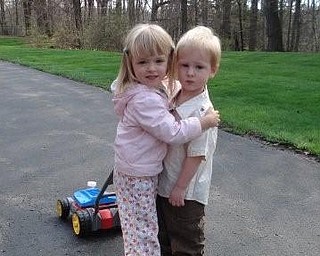Here is my daughter Gracie Pesa 3 1/2 years old with her best friend Benjamin Evankovich of Boardman
2 1/2 years old. The picture was taken by Ben's Dad Gary Evankovich. When asked what they were doing, Gracie said "we're getting married". — Lori Pesa of Liberty