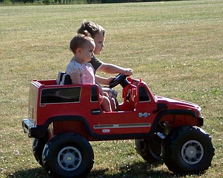Logan and Abby Lordi taking a ride in Logan's new car that he got for his birhday. They are our grandchildren ( Frank and Crystal Lordi of Newton Falls are the parents)
Marianne B Lordi, Youngstown