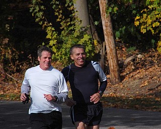 Leonard Blount and Lou Champney enjoy a run in Mill Creek Park.