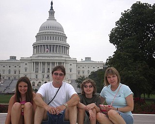 Here is a family picture showing togetherness. It is from August 7, 2008 in front of the Capital in Washington, D.C. Pictured are Liana (age 10), Eric, Sean (age 12) and Melissa Pregi. Our first visit to Washington D.C. during a very historic election year.