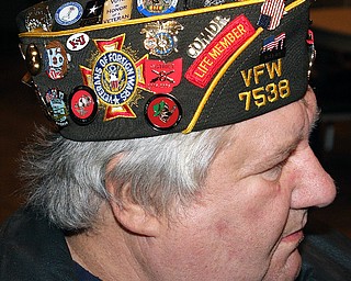 PAYING TRIBUTE: Veteran Jerry Arendas of Coitsville, who served in the Vietnam War, attends Mass at St. Christine Church in Youngstown to commemorate the 67th anniversary of the attack on Pearl Harbor.