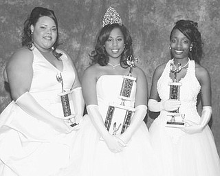 <p>Special to The Vindicator</p>
<p>CROWNING MOMENT: Proudly displaying the trophies they received at the annual Cinderella Ball are three young women who were among the 16 debutantes vying for the title of Miss Cinderella 2008. They are, from left, Brianah Lourrae&#8217; Lewis, second runner-up; Mackenzie Blackmon, who was named Miss Cinderella 2008; and Eve Danielle Griffin, first runner-up.</p>