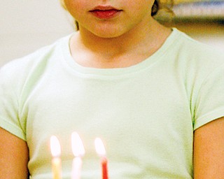 Abigail Sharf, third grader at Akiva Academy, lights the Menora - Each night during Chanukah Jews light candles in a special candelabra called a Menorah (Hebrew: Hanukiyah). The center candle, called the Shamash, is always the first candle placed in the Menorah and the first candle to be lit each night. The remaining candles are placed and lit in a specific order depending on the night of the celebration.