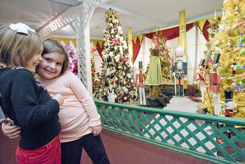 Meredith Lauther gets a hug from her cousin, Lexi Tonty, both 4 year old residents of Sharpsville, while viewing the displays at Kraynaks in Hermitage, PA. "This is where we come after pre-school," says Lauther's grandma, Linda Hazi, "we've been here at least ten times this year."