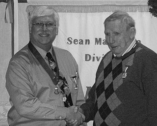 <p>Special to The Vindicator</p>
<p>CONGRATULATIONS: After they received a prestigious Commodore John Barry Medal at a meeting of the Sean MacBride Dividion, Ancient Order of Hibernians, from left, Jay Bice and Jerry Donohoe, congratulate each other.</p>