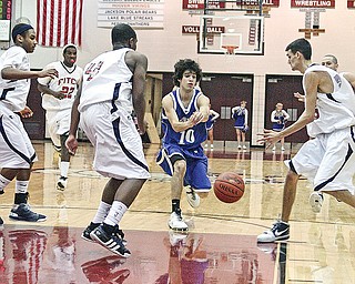 FITCH - POLAND - (10) Niko Fatimus of Poland finds a hole in the Fitch defense during their game Saturday night in Boardman.