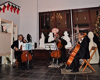 Father Vit and Friends play cello as part of First Night Youngstown 2009
