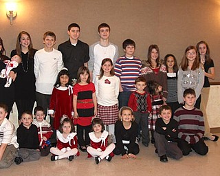 A photograph of the younger generation of the Menichini Family from Lowellville celebrating at their annual Christmas Eve Party 2008 at the Lowellville Mt. Carmel Hall.
Photo submitted by Jodi Coppola