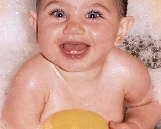 Mary Verona Averell, 7 months, enjoys her bubbles and rubber ducky after a sleepover with grandparents Richard and Mary Jo Averell of Boardman. Her parents are R. Justin and Carrieann Averell of Boardman.