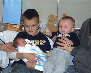 Bill Valentino's third grandson,Vas, was born 11/11/08, shown here with cousins Anthony and Kevin.
The proud grandfather sent the photo.
