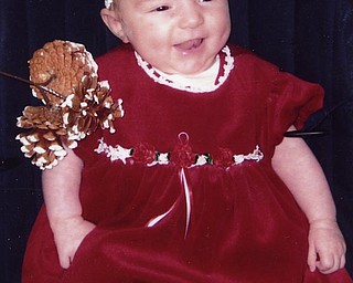 Kaylie Eva Lindquist, 2 1/2 months, got her picture taken in her new dress that her grandmother, Linda Lamanne of Austintown, bought for her. Her parents are Jeannine and Jason Lindquist of Forest Lake, Minn.