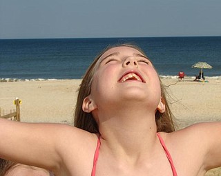 Name of child: Ella Polen (sister Lily is in the background)
City: Canfield
Place of Photo: Assateague Island, Maryland
Date: June 2008
Photographer: Charmayne Polen (Mom)